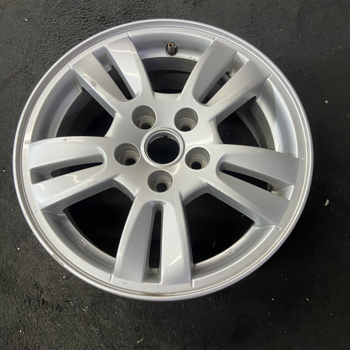 15" SONIC 12-16 15x6, aluminum Original OEM Wheel Rim - Close-Up Detail