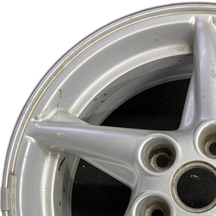 16" GRAND PRIX 99 16x6.5 aluminum 5 spoke off-set sparkle silver Original OEM - Angle View