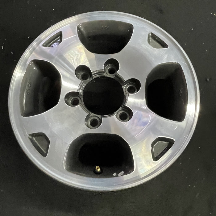 15" XTERRA 00 , alloy, 4 spoke polished Original OEM Wheel Rim