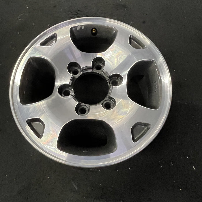 15" XTERRA 00 , alloy, 4 spoke polished Original OEM Wheel Rim