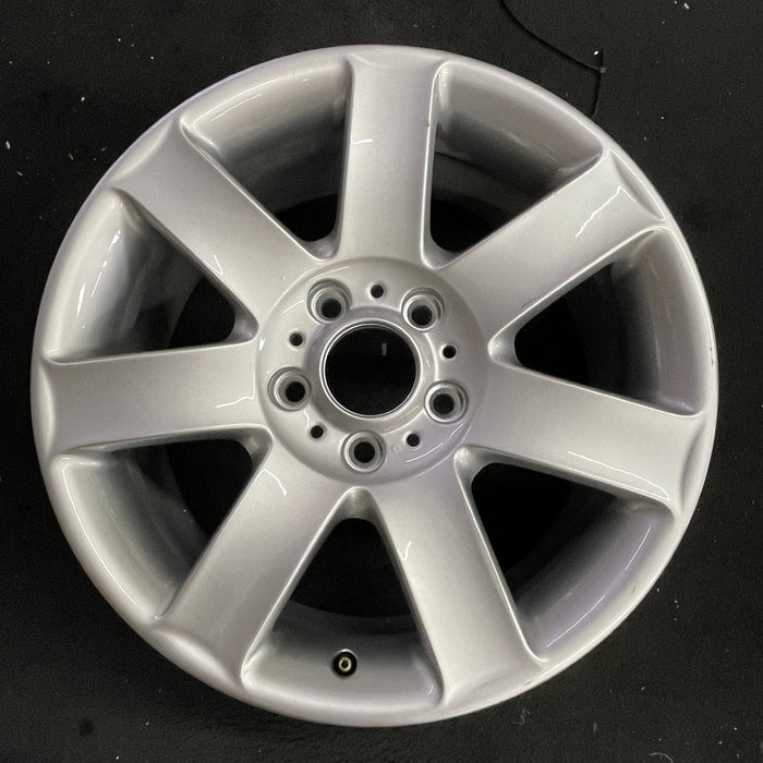 17" BMW 320i 01-05 , 17x8 , 7 spoke, exposed lug nuts, flat spoke Original OEM - Angle View
