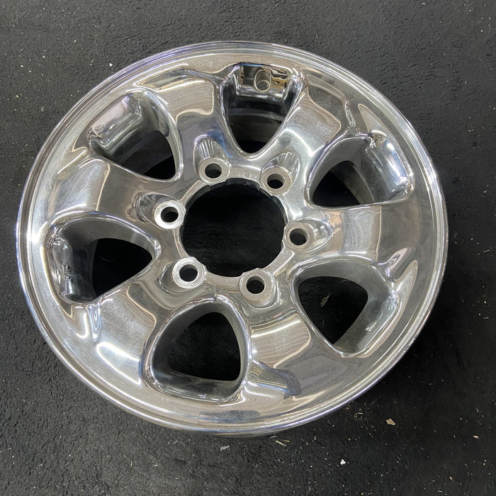 15" MONTERO 94-02 15x6, alloy Original OEM Wheel Rim