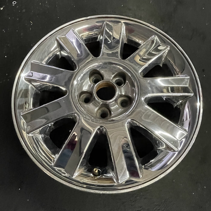 16" SEBRING 04-05 Conv, 16x6.5 , 9 spoke , chrome Original OEM Wheel Rim - Side Profile