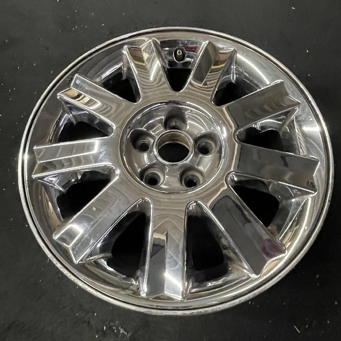 16" SEBRING 04-05 Conv, 16x6.5 , 9 spoke , chrome Original OEM Wheel Rim - Close-Up Detail