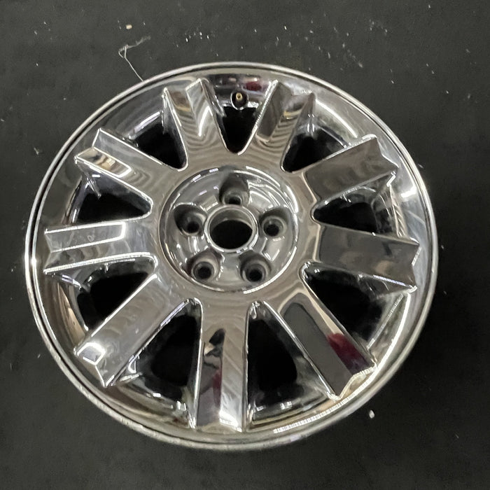 16" SEBRING 04-05 Conv, 16x6.5 , 9 spoke , chrome Original OEM Wheel Rim - Close-Up Detail
