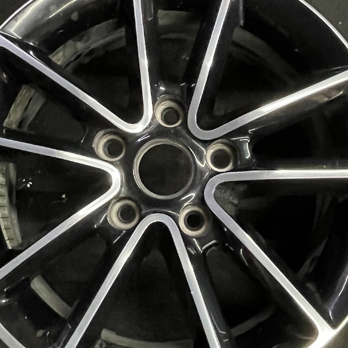 17" CARAVAN 14 17x6.5 aluminum 10 spoke polished face with pockets black - Angle View