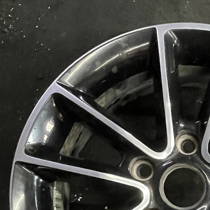 17" CARAVAN 14 17x6.5 aluminum 10 spoke polished face with pockets black - Side Profile