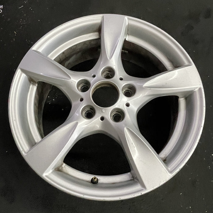 17" BMW 128i 08-13 17x7 , 5 spoke, solid spoke, peaked spoke edges Original OEM - Side Profile