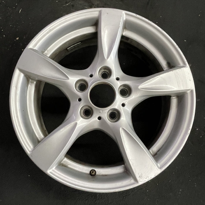 17" BMW 128i 08-13 17x7 , 5 spoke, solid spoke, peaked spoke edges Original OEM - Angle View
