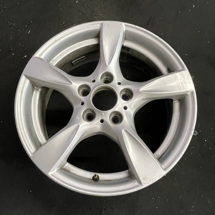 17" BMW 128i 08-13 17x7 , 5 spoke, solid spoke, peaked spoke edges Original OEM - Side Profile
