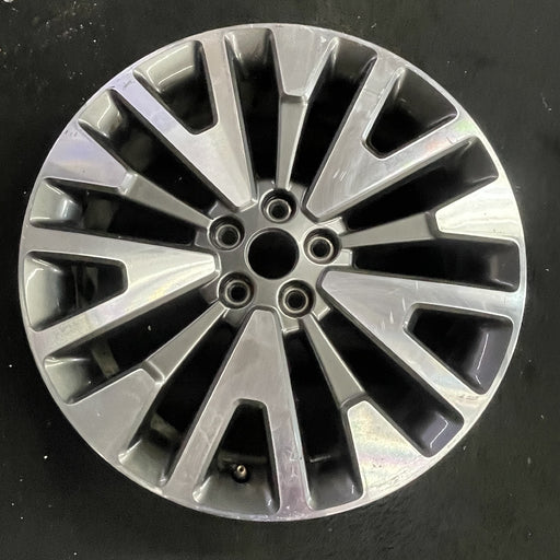 19" ESCAPE 20-22 19x7 , , machined face with gray pockets Original OEM Wheel Rim - Angle View