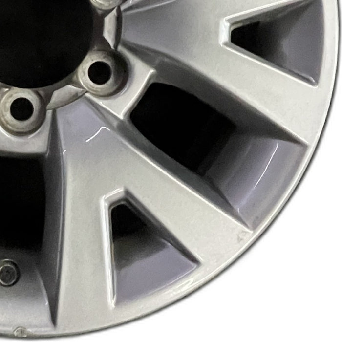16" TACOMA 16 16x7 alloy 6 spoke V spoke silver Original OEM Wheel Rim - Close-Up Detail