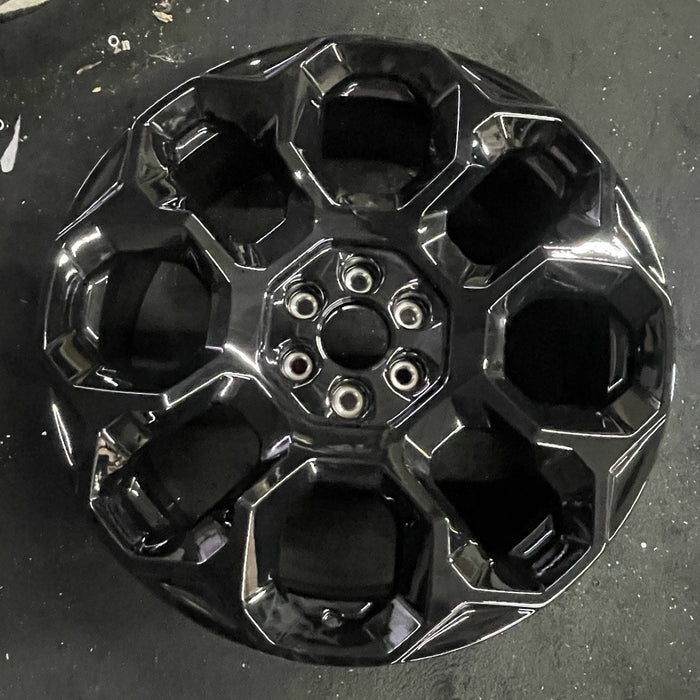 24" SUBURBAN 1500 25 24x9.5, 8 holes, black Original OEM Wheel Rim - Angle View