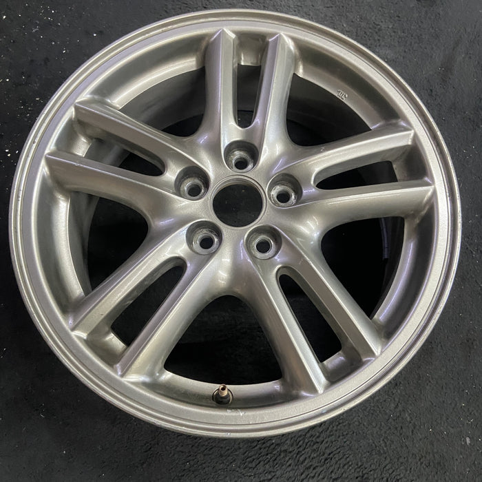 16" IMPREZA 04-05 16x6.5 , 10 spoke, peaked spoke Original OEM Wheel Rim - Side Profile