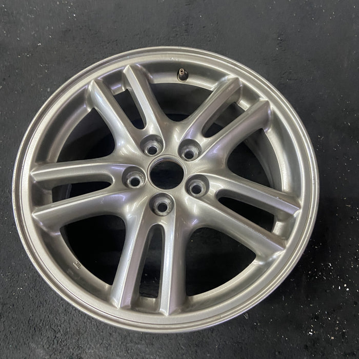 16" IMPREZA 04-05 16x6.5 , 10 spoke, peaked spoke Original OEM Wheel Rim - Close-Up Detail