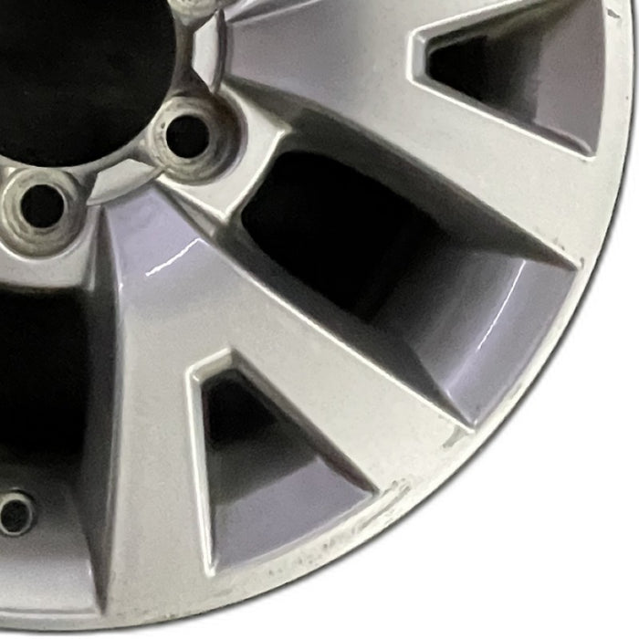 16" TACOMA 16 16x7 alloy 6 spoke V spoke silver Original OEM Wheel Rim - Close-Up Detail