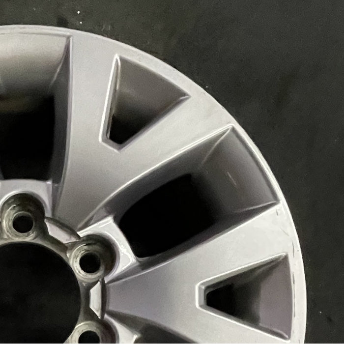 16" TACOMA 16 16x7 alloy 6 spoke V spoke silver Original OEM Wheel Rim - Close-Up Detail