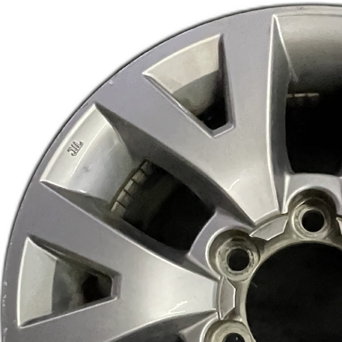 16" TACOMA 16 16x7 alloy 6 spoke V spoke silver Original OEM Wheel Rim - Angle View