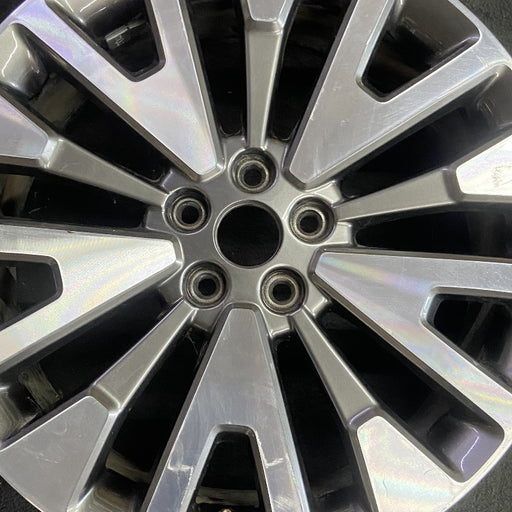 19" ESCAPE 20-22 19x7 , , machined face with gray pockets Original OEM Wheel Rim - Angle View