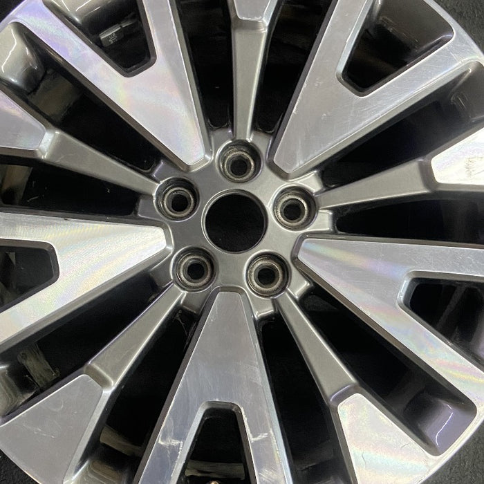 19" ESCAPE 20-22 19x7 , , machined face with gray pockets Original OEM Wheel Rim - Angle View