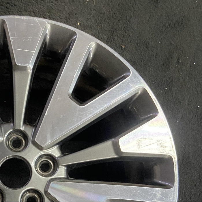 19" ESCAPE 20-22 19x7 , , machined face with gray pockets Original OEM Wheel Rim - Close-Up Detail
