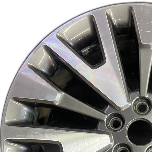 19" ESCAPE 20-22 19x7 , , machined face with gray pockets Original OEM Wheel Rim - Angle View