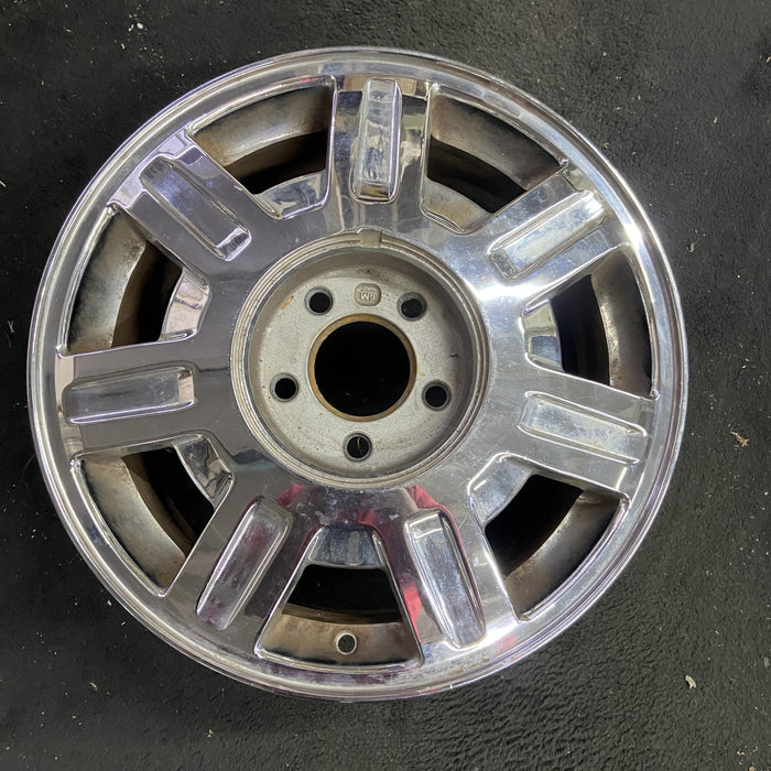 16" DEVILLE 03-05 5 lug, Base, 16x7, , chrome, opt QC6 Original OEM Wheel Rim - Angle View