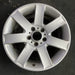17" BMW 320i 01-05 , 17x8 , 7 spoke, exposed lug nuts, flat spoke Original OEM - Angle View