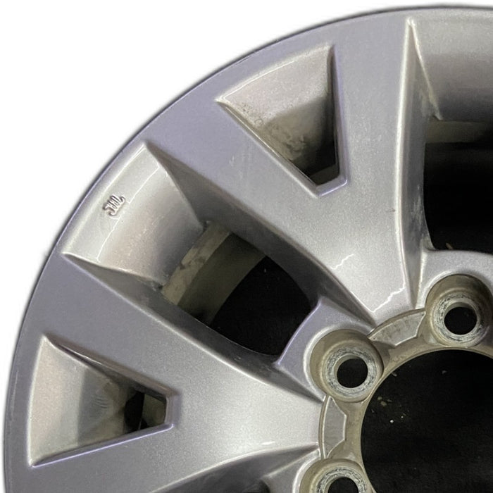 16" TACOMA 16 16x7 alloy 6 spoke V spoke silver Original OEM Wheel Rim - Angle View