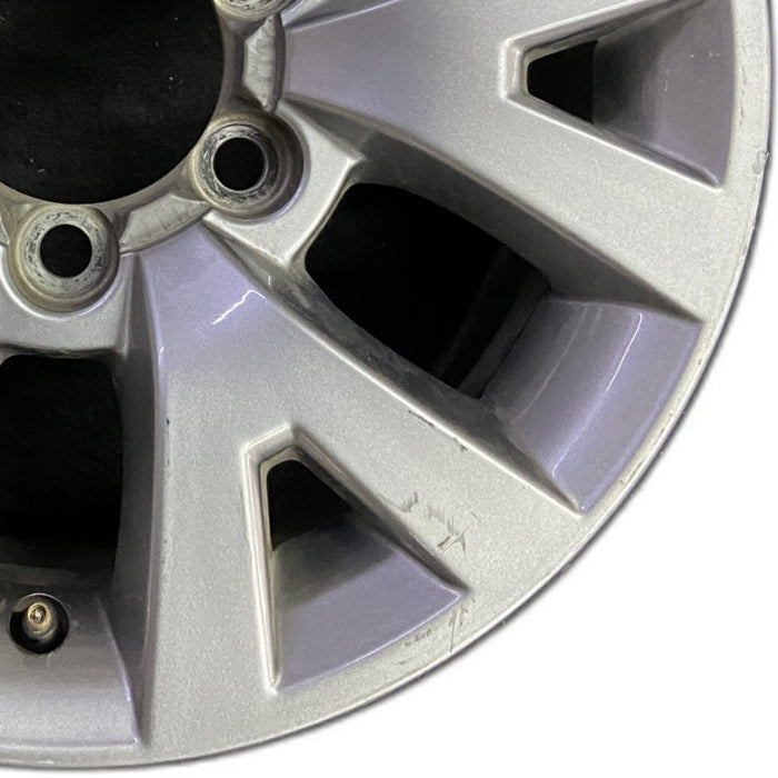 16" TACOMA 16 16x7 alloy 6 spoke V spoke silver Original OEM Wheel Rim - Close-Up Detail