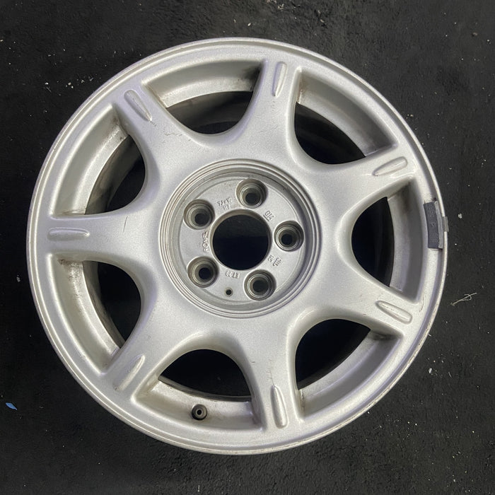 16" CATERA 97-98 16x7 , 7 spoke Original OEM Wheel Rim - Angle View