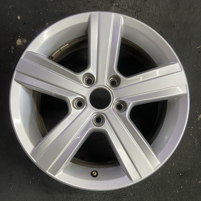 16" GOLF 15-17 16x6.5, alloy, 5 spoke, raised spokes Original OEM Wheel Rim - Angle View