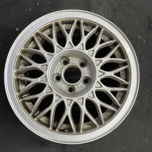 15" CORRADO 92 15x6.5 , 6 cylinder Original OEM Wheel Rim - Angle View