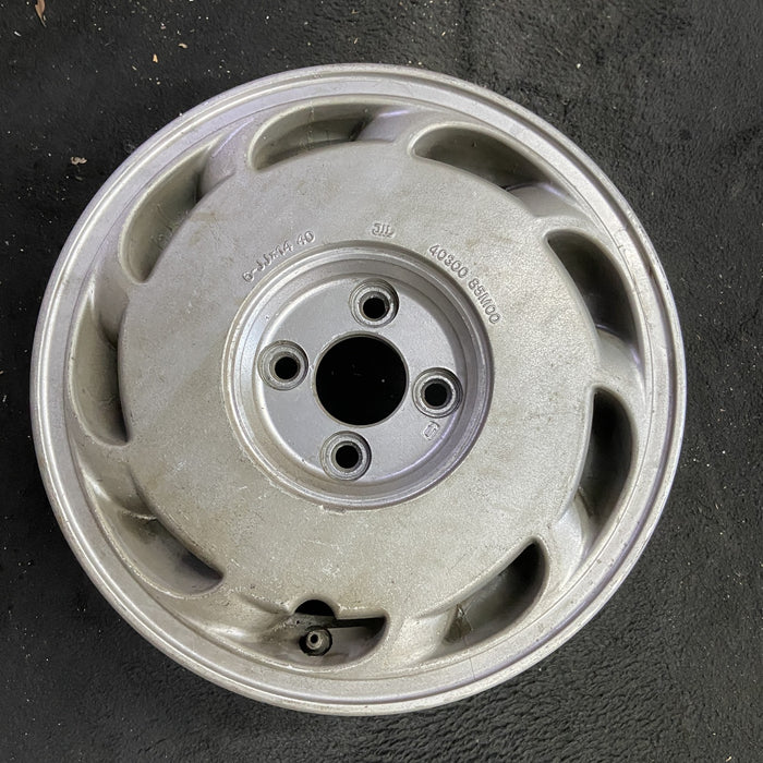 14" PULSAR 87-90 14x6 , L. Original OEM Wheel Rim - Angle View