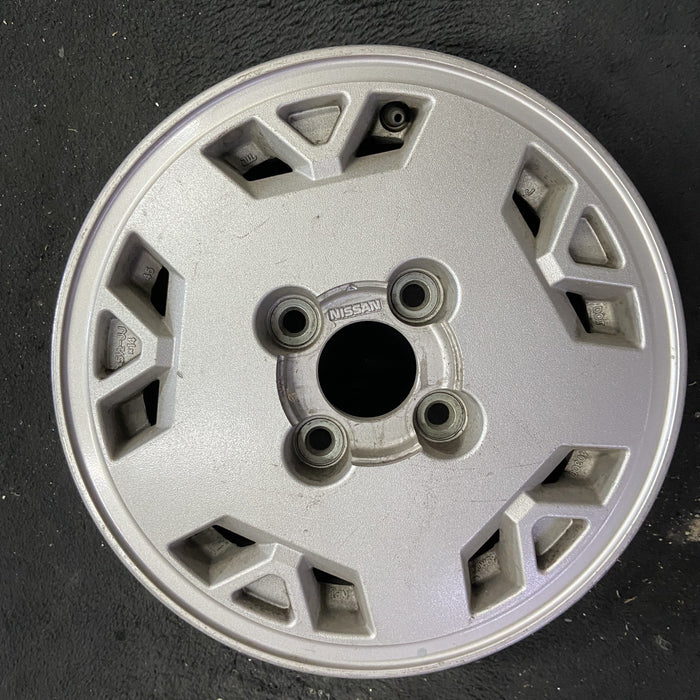 14" STANZA VAN 86-88 14x5.5 Original OEM Wheel Rim - Angle View