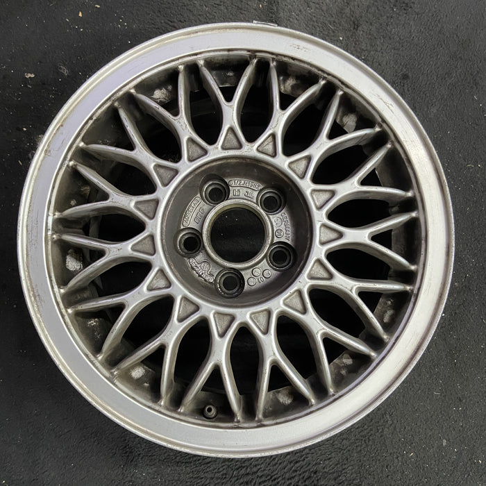 15" CORRADO 92 15x6.5 , 6 cylinder Original OEM Wheel Rim - Angle View