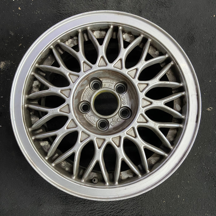 15" CORRADO 92 15x6.5 , 6 cylinder Original OEM Wheel Rim - Angle View