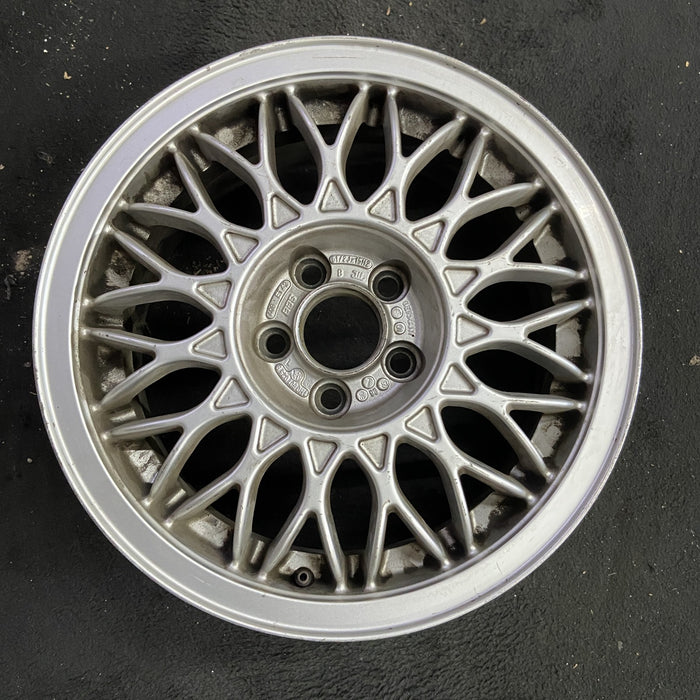15" CORRADO 92 15x6.5 , 6 cylinder Original OEM Wheel Rim - Angle View