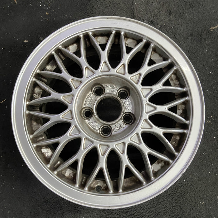 15" CORRADO 92 15x6.5 , 6 cylinder Original OEM Wheel Rim - Angle View
