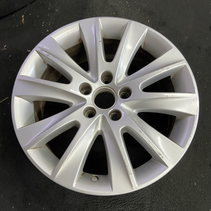 17" TIGUAN 09-11 17x7, 10 spoke, w/raised edge Original OEM Wheel Rim - Side Profile