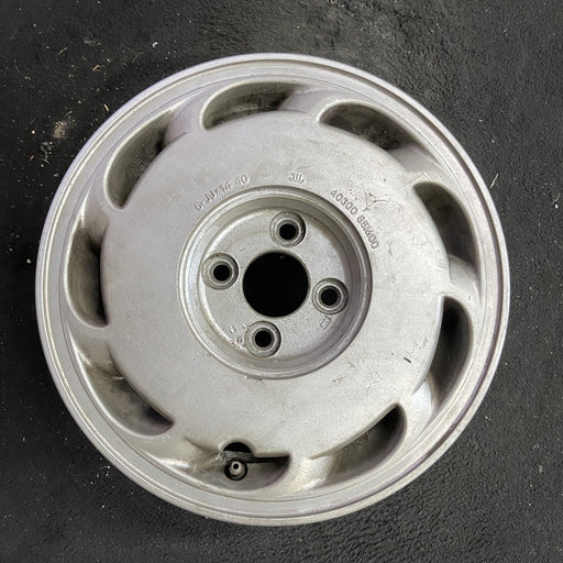 14" PULSAR 87-90 14x6 , L. Original OEM Wheel Rim - Angle View