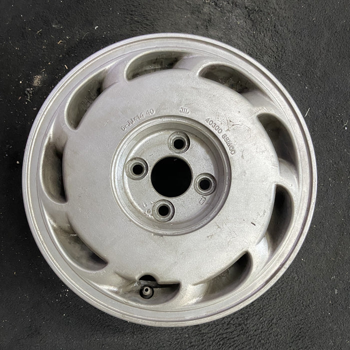 14" PULSAR 87-90 14x6 , L. Original OEM Wheel Rim - Angle View