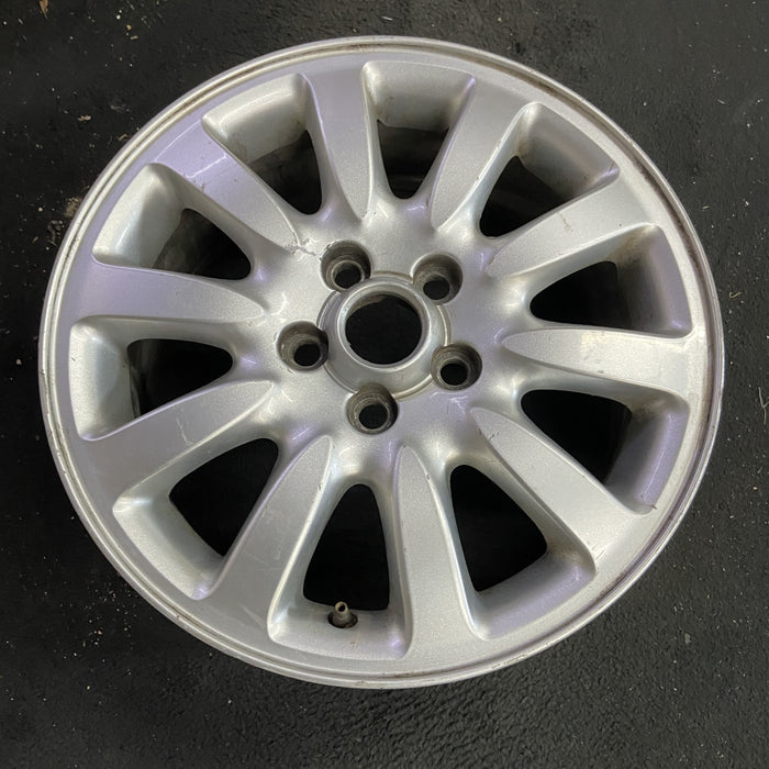16" X TYPE 02-03 , 16x6.5, alloy, 10 spoke Original OEM Wheel Rim - Side Profile