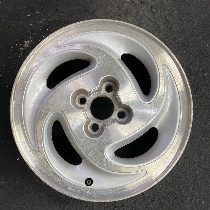 15" SATURN S SERIES 92 15x6 , 4 slot Original OEM Wheel Rim - Angle View