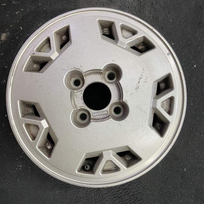 14" STANZA VAN 86-88 14x5.5 Original OEM Wheel Rim - Angle View