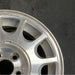 15" TAURUS 98-99 15x6 aluminum 12-windows dark argent Original OEM Wheel Rim - Close-Up Detail