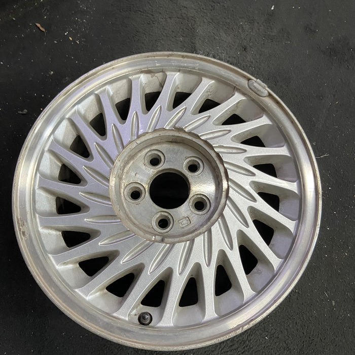 16" LINCOLN MARK SERIES 93-94 16x7 , directional spokes, chrome, L. Original - Side Profile