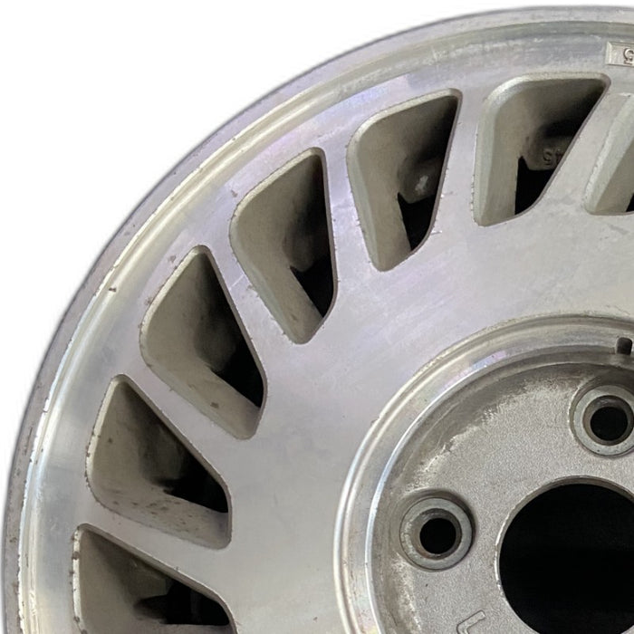 15" LEGEND 87-88 15x5.5 2 Dr L. Original OEM Wheel Rim - Angle View