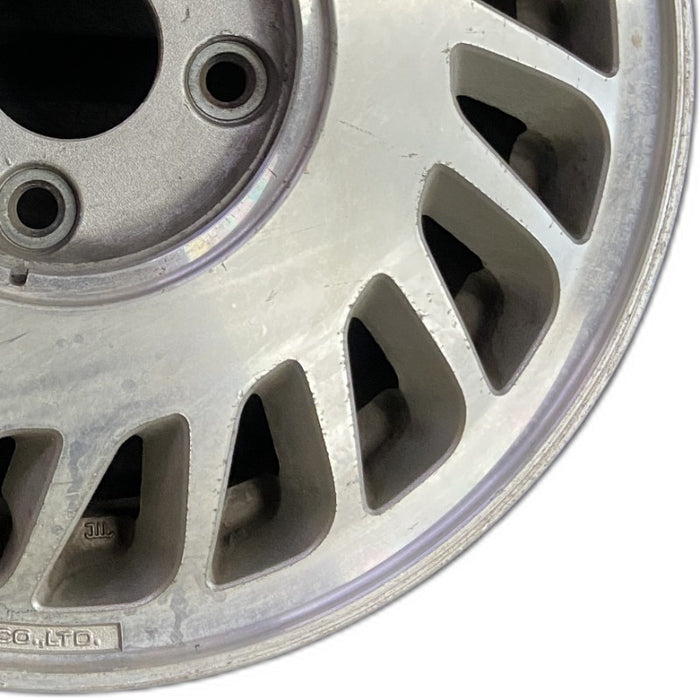15" LEGEND 87-88 15x5.5 2 Dr L. Original OEM Wheel Rim - Close-Up Detail