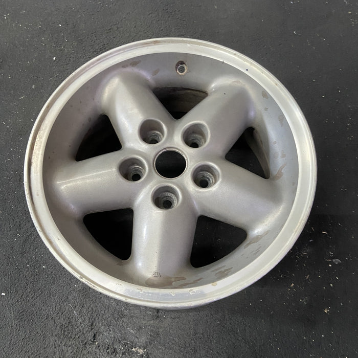 15" CHEROKEE 96 15x7, aluminum, 5 spoke Original OEM Wheel Rim - Close-Up Detail